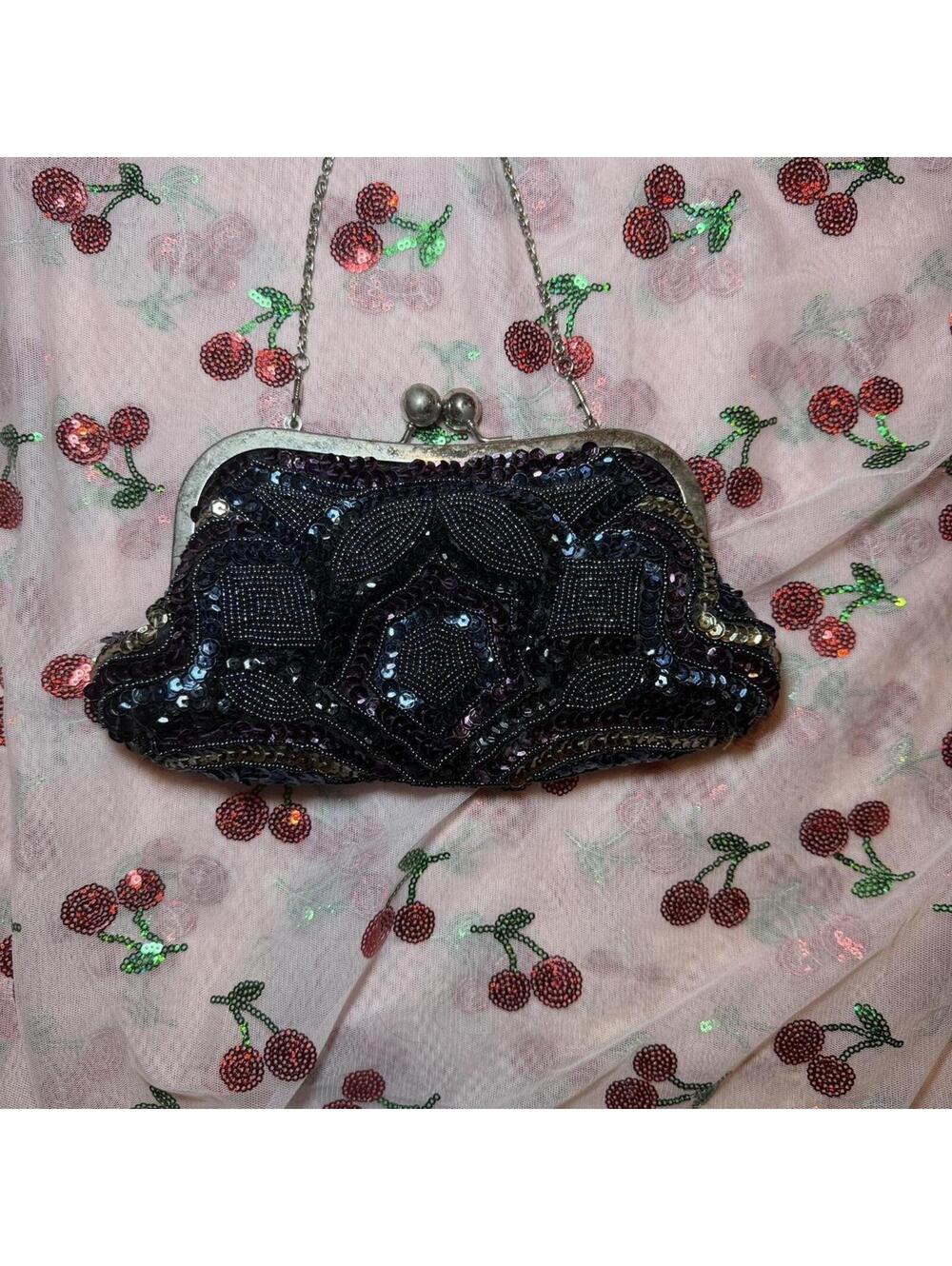Black beaded purse with silver frame and chain strap